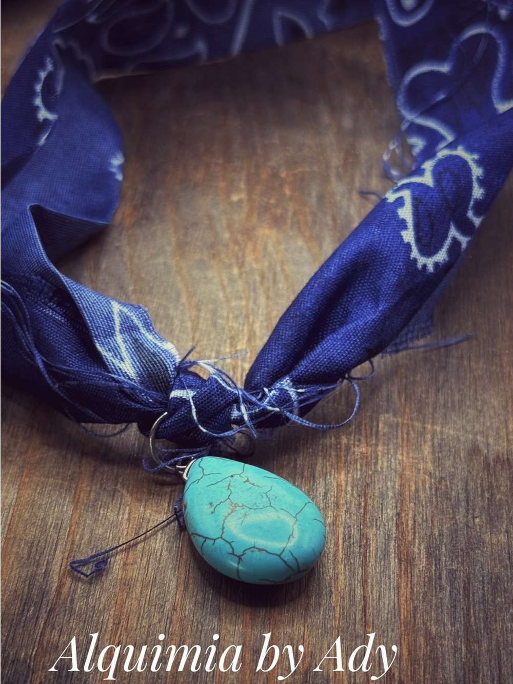 Scarf with pendant